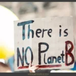 A picture with the phrase"there is no planet B" written set as a featured image for the article The Environment Crisis Fight & Solutions