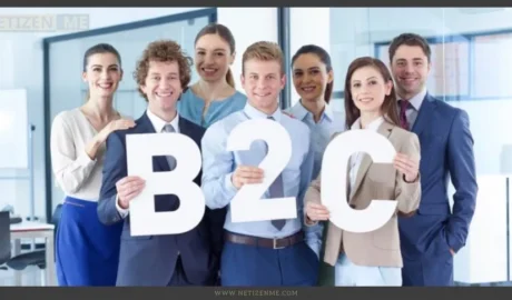 A group of people who hold the letters B 2 C